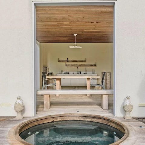 Sip a glass of wine in the hot tub – the perfect way to spend an evening