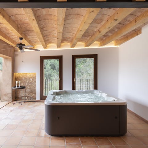 Treat yourself to an indulgent soak in the shared hot tub 