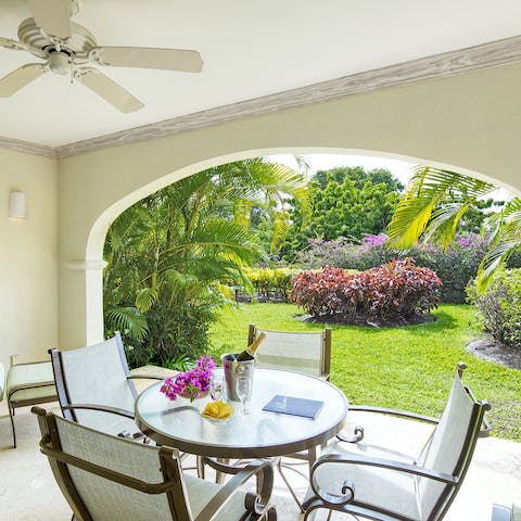 Sip a refreshing rum punch on the private terrace amongst beautiful gardens