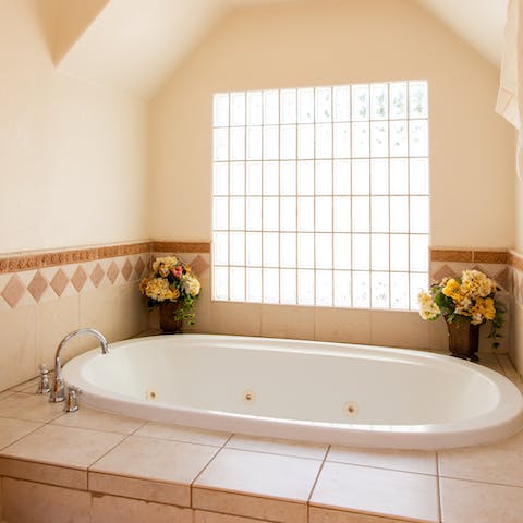 Indulge in a rejuvenating soak in the spa bath