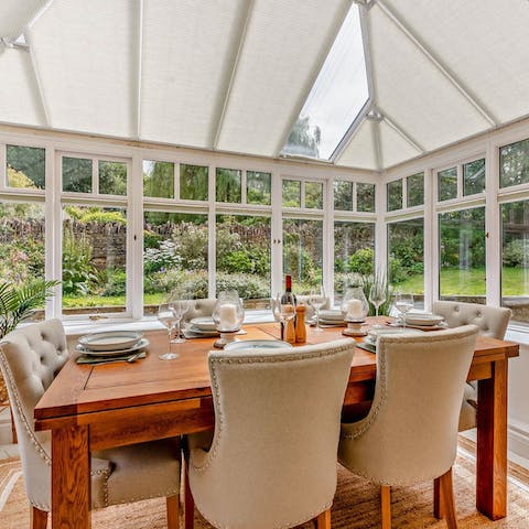 Rustle up a family dinner to share in the light-filled conservatory 