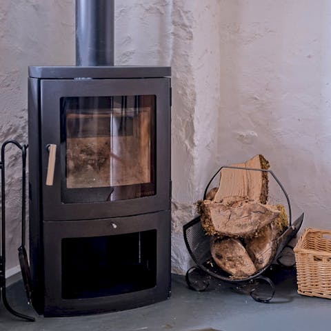 Pop some logs in the wood burner after a long woodland walk