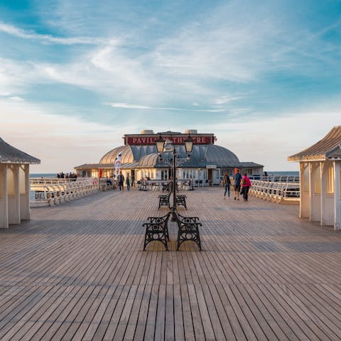 Visit the 150m-long Victorian pier in nearby Cromer, a twenty-minute drive away
