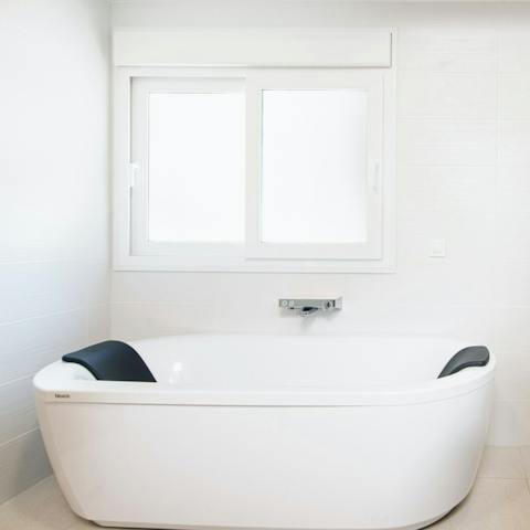 Treat yourself to an extra-long soak in the freestanding tub
