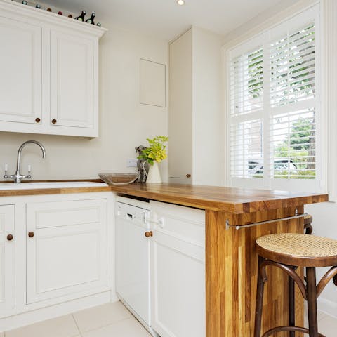 Have your host arrange for the private chef to come over and cook in the country-style kitchen