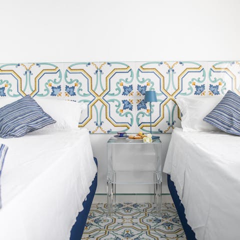 Admire the hand-painted tiles throughout the villa