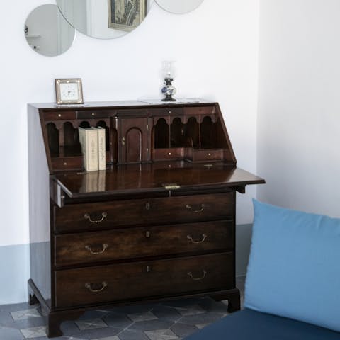 Indulge in a creative moment at one of the antique writing desks