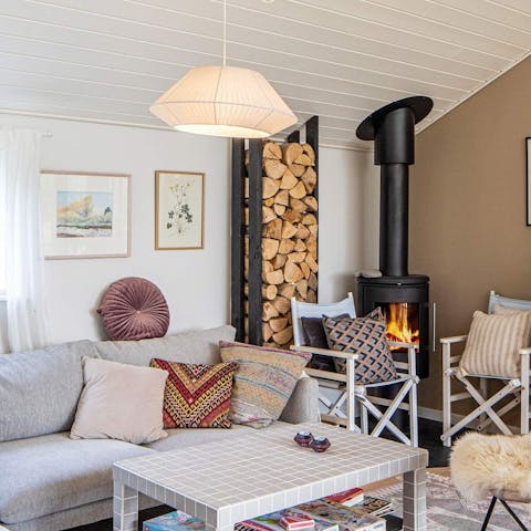 Settle into your cottage-style living room with the fire blazing