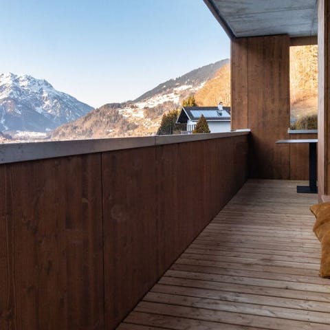 Step out onto the private balcony to breathe in the fresh mountain air 