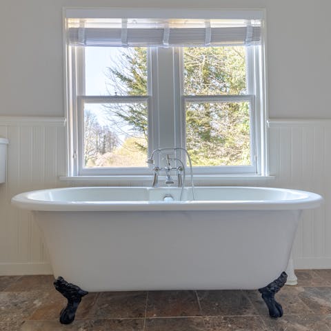 Soak in the elegant free-standing bathtub
