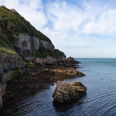 Take the ten-minute drive to Benllech and relax on the beach