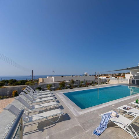 Soak up the sea views from your pool
