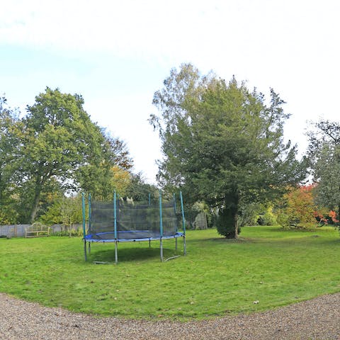 Watch the little ones let off steam on the trampoline