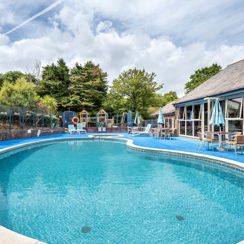 Dive into the depths of the cool outdoor pool for an instant refresh from the sun