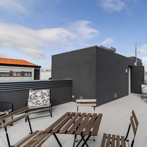 Enjoy a couple of drinks on the private roof terrace as the sun goes down