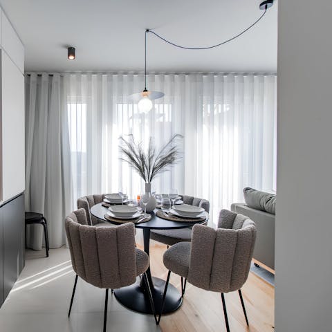 Host a home cooked meal using ingredients from the local market