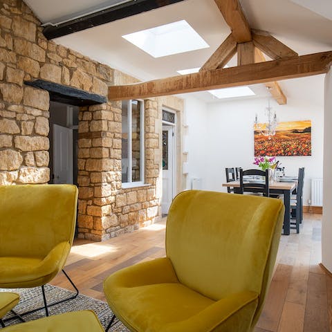Admire the character features such as the exposed Cotswold stone walls and beams