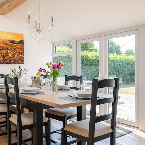Open up the French doors to the garden and have breakfast at your dining table