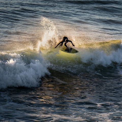 Ride the waves at Surfrider Beach – just a five-minute drive away