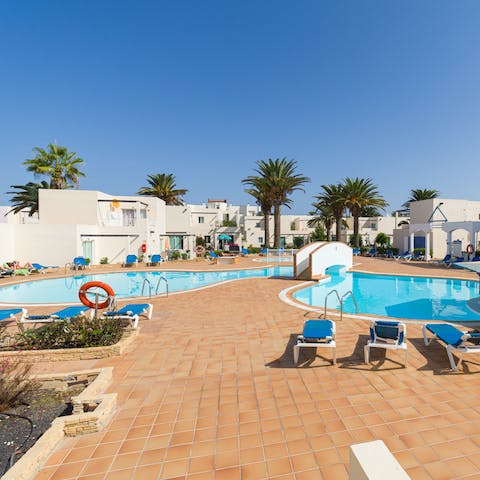 Take a dip in the on-site pool before walking over to the nearby Gran Casino Corralejo