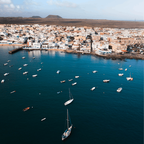 Explore charming Corralejo and stroll down to the fine sands of the Playa del Medio