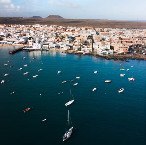 Explore charming Corralejo and stroll down to the fine sands of the Playa del Medio