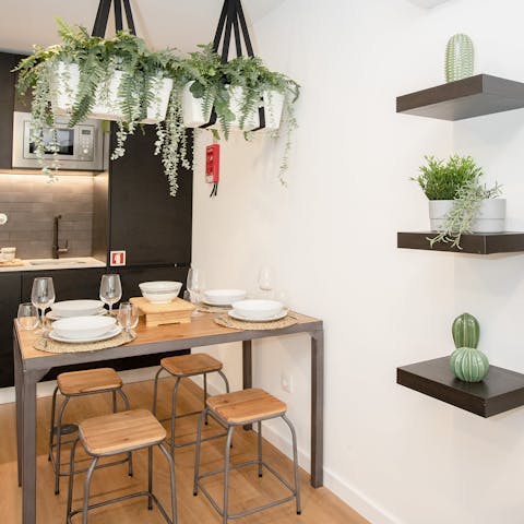 Plan the day's activities at the breakfast bar beneath pot plants