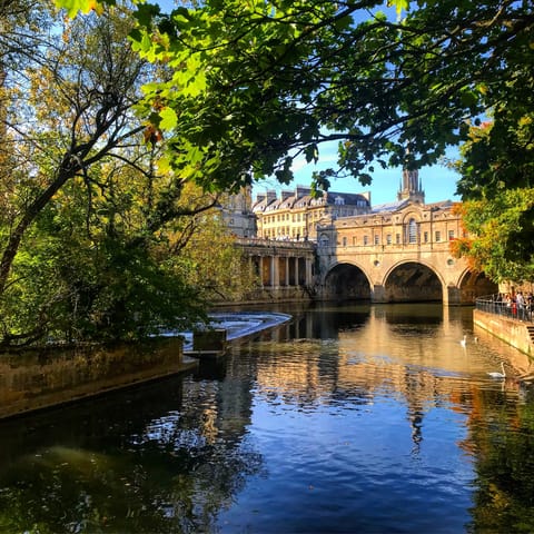Wander down to the centre of Bath and the scenic Pulteney Bridge