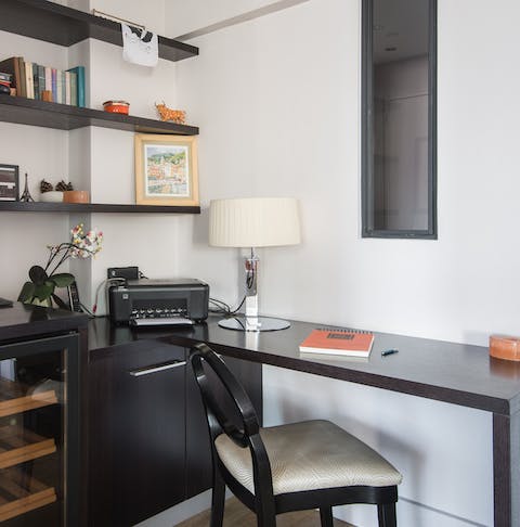 Catch up on work at the sleek desk space