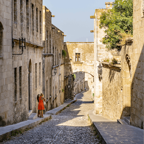 Spend an afternoon getting lost in the narrow streets of Rhodes' Old Town – it's a twelve-minute drive
