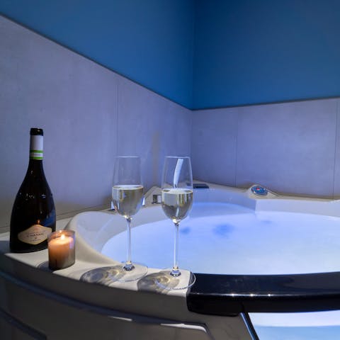 Treat yourself to a relaxing soak in the Jacuzzi tub