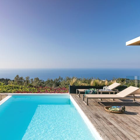 Catch some rays on the sun loungers before jumping into the glistening pool