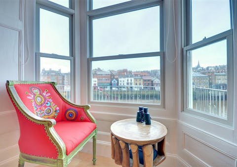 Gaze out over the working harbour from your comfy lookout