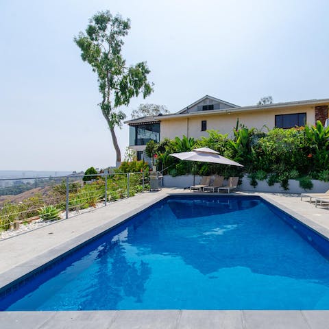 Splash about in the fiberglass pool with a stunning view of LA as your backdrop