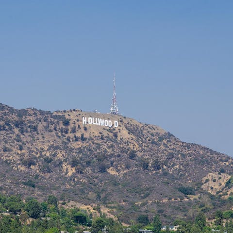 Gaze out at the Hollywood Sign from your balcony, before making the fifteen-minute drive to Griffith Park to see it up close