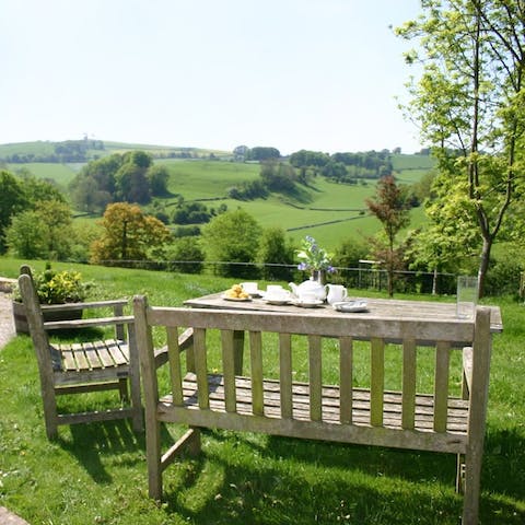 Set the alfresco picnic table ready for cream tea in the sunshine