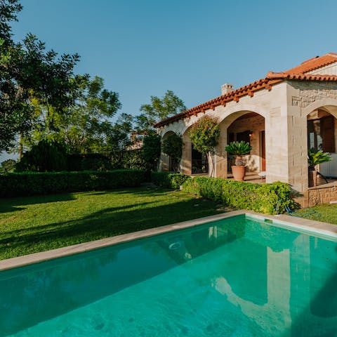 Have a dip in the private pool surrounded by pretty gardens