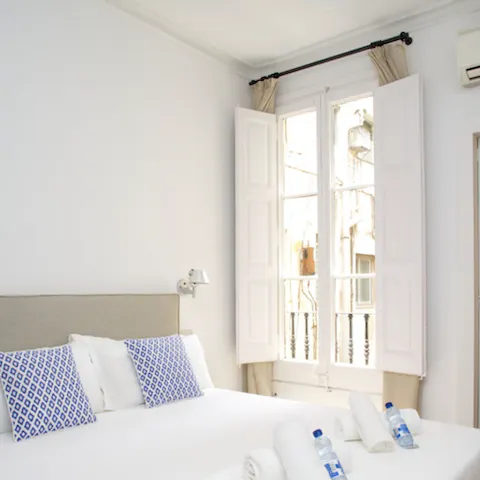 Wake up after a restful sleep and open your shutters to let a beautiful natural light flood in