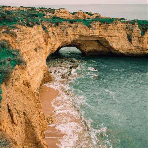Explore the ruggedly handsome coastline and golden sandy beaches of the Algarve