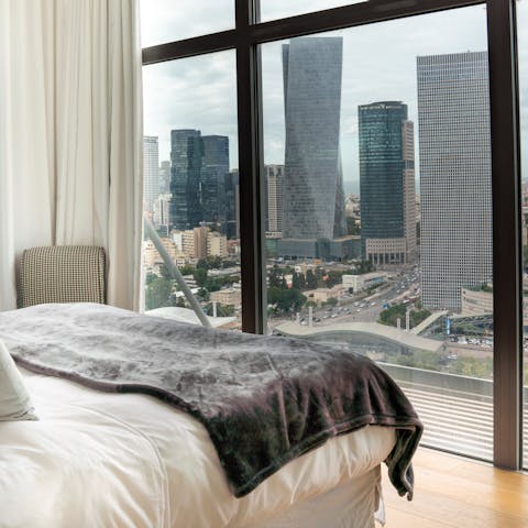 Wake up to breath-taking views of the city from your bedroom