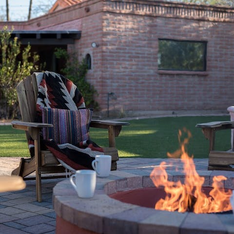 Relax by the fire pit as the sun goes down