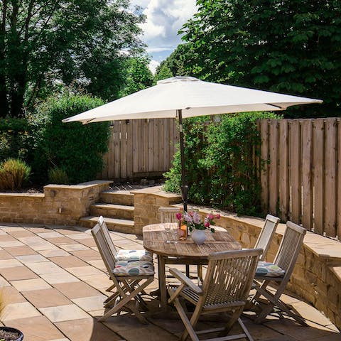 Retreat to the outdoor patio area for a spot of al fresco dining in the sun