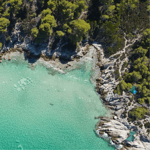 Explore the beautiful beaches and coves nestled along the coast of Halkidiki