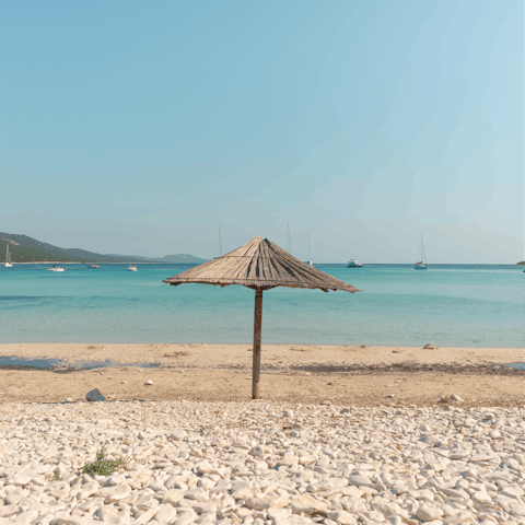 Let the sea wash over your feet at Foki beach