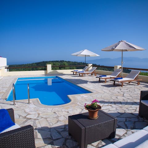 Swim in the private pool to cool off in the Greek heat