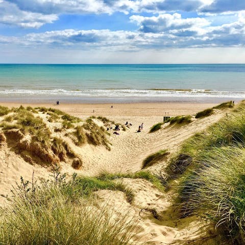 Slip on your sandals and skip down to Camber Sands, less than fifteen minutes from your doorstep