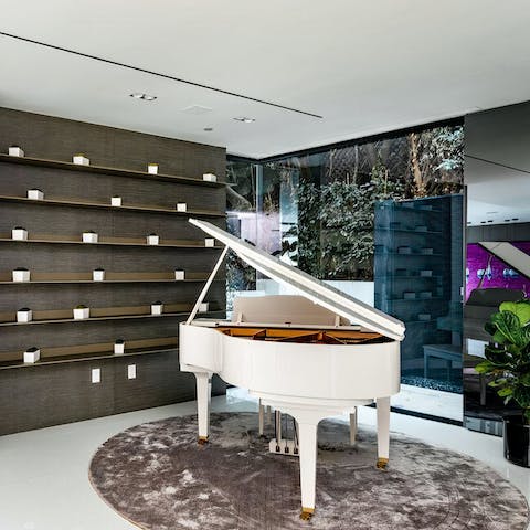 Show off your musical talents on the white grand piano