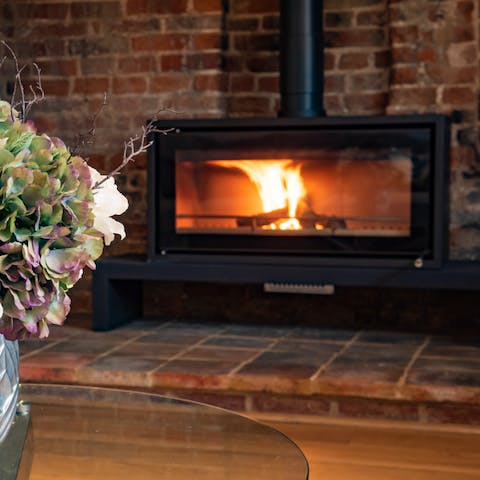 Curl up by the roaring fire after a long walk in the Norfolk countryside
