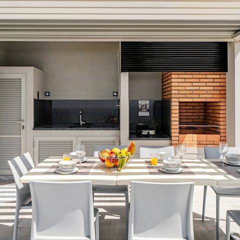 Dine alfresco on seafood dishes straight from the built-in barbecue