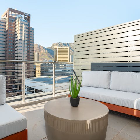 Take in the views of the city and Table Mountain from your private balcony